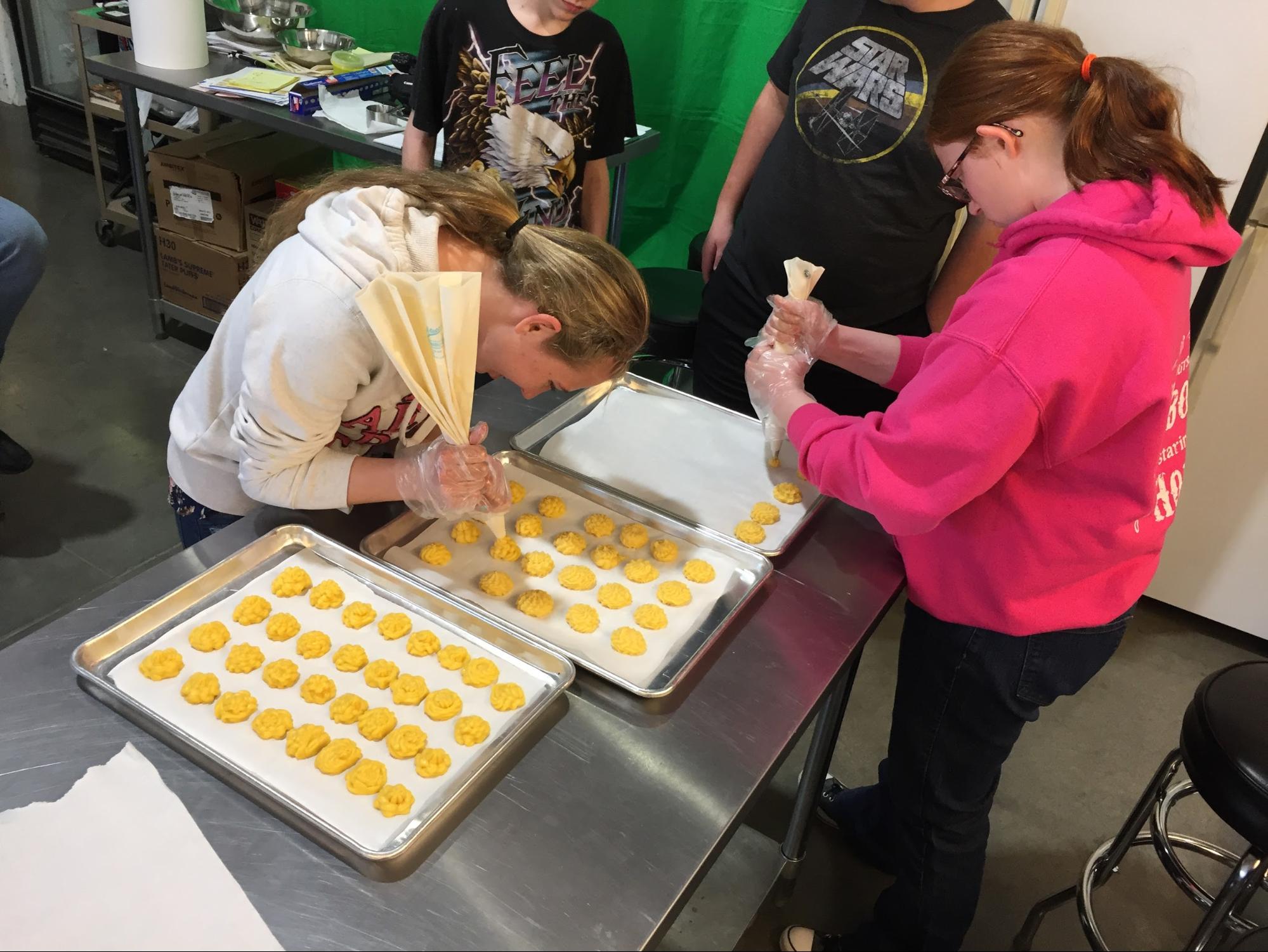 Students making choux pastry