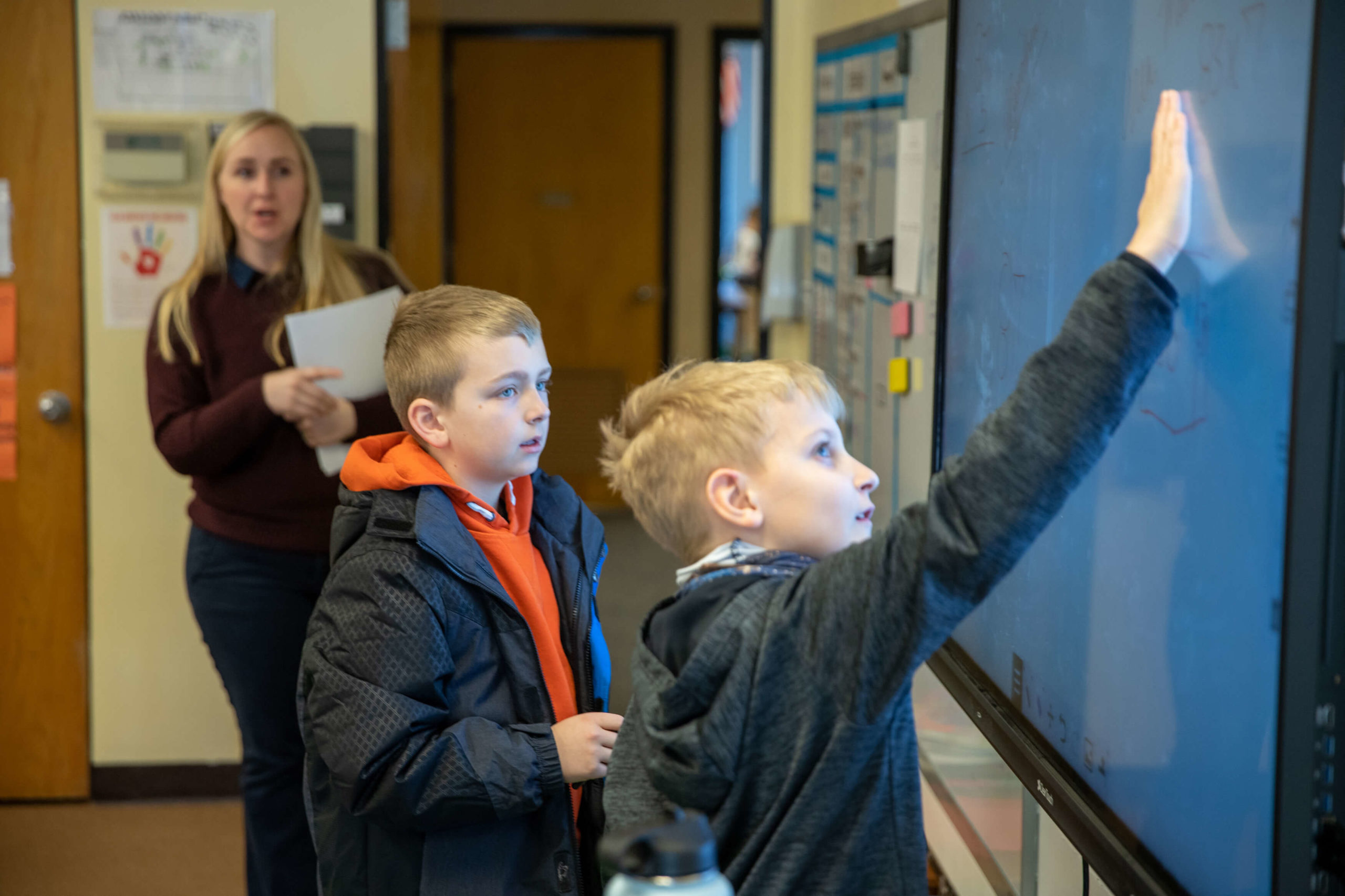 Children using an interactive board during class in the hagerman school district.